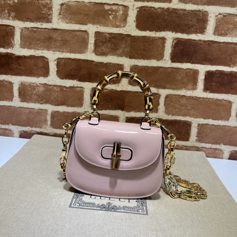 G*u*i top handle bags